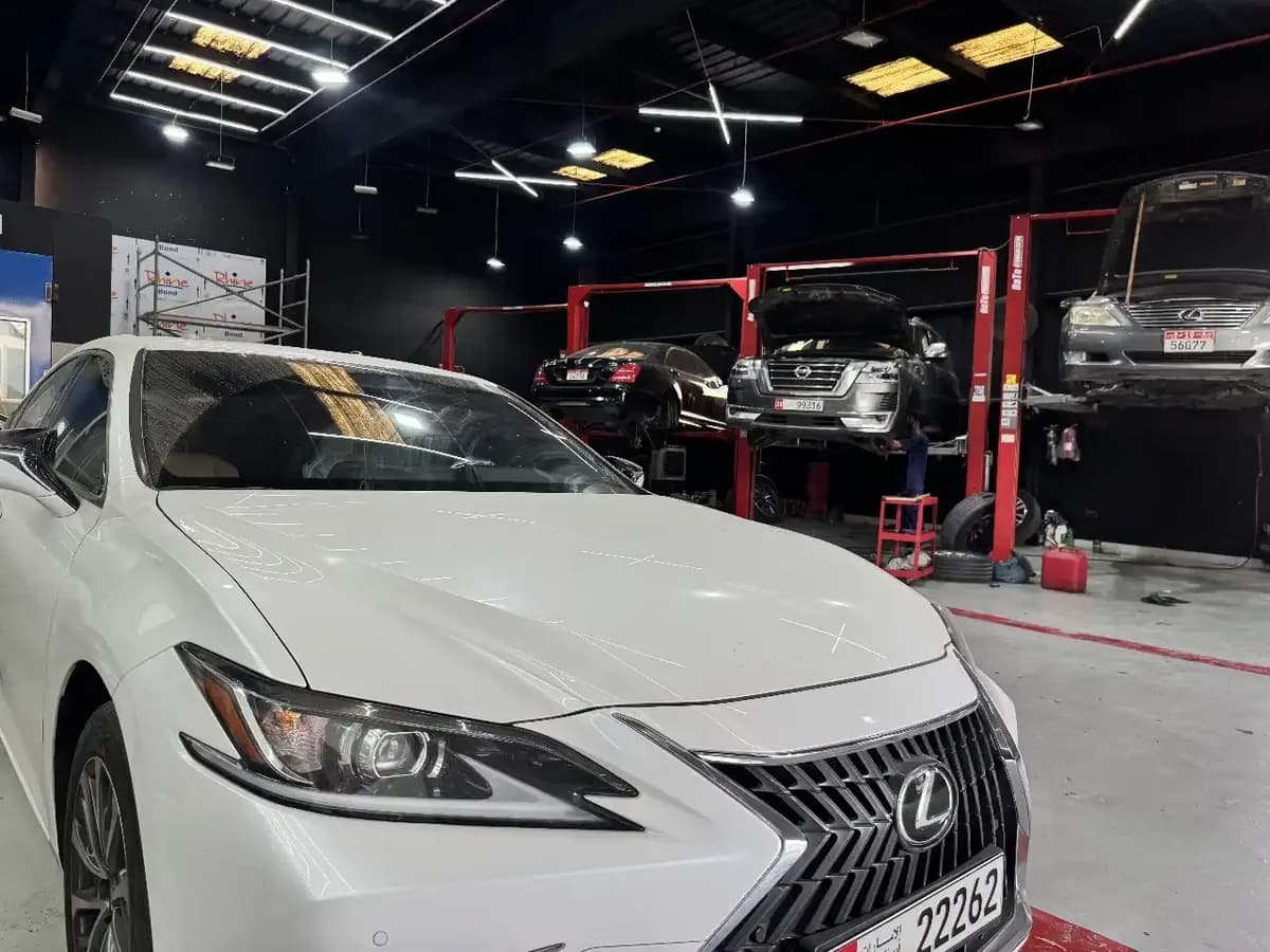 Service bays and lifts at the Zenfo Auto Services workshop in Abu Dhabi